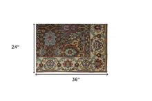 4' X 6' Ivory Brown And Blue Wool Floral Hand Knotted Distressed Stain Resistant Area Rug With Fringe
