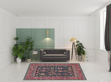 4' X 6' Pink Blue And Orange Wool Floral Hand Knotted Distressed Stain Resistant Area Rug With Fringe