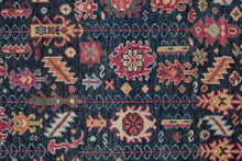 4' X 6' Pink Blue And Orange Wool Floral Hand Knotted Distressed Stain Resistant Area Rug With Fringe