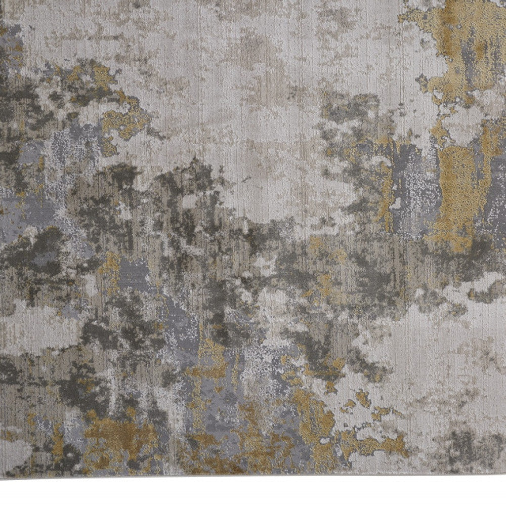 5' X 8' Ivory Gold And Gray Abstract Stain Resistant Area Rug