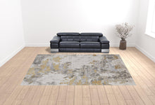 5' X 8' Ivory Gold And Gray Abstract Stain Resistant Area Rug