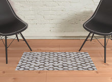 5' X 8' Gray Taupe And Silver Geometric Hand Woven Area Rug