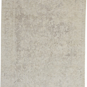 5' X 8' Ivory And Tan Abstract Hand Woven Area Rug