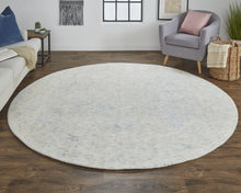 5' X 8' Ivory And Tan Abstract Hand Woven Area Rug