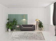 5' X 8' Ivory And Tan Abstract Hand Woven Area Rug