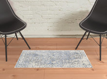 5' X 8' Blue Ivory And Gray Abstract Hand Woven Area Rug