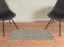 4' X 6' Black Gray And Taupe Wool Geometric Tufted Handmade Stain Resistant Area Rug