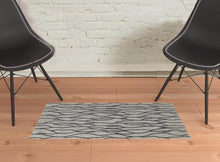 4' X 6' Taupe Black And Gray Wool Abstract Tufted Handmade Stain Resistant Area Rug