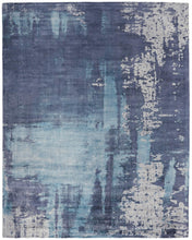 8' X 10' Blue And Ivory Abstract Hand Woven Area Rug