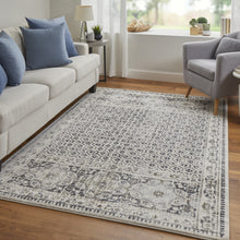 4' X 6' Ivory Taupe And Gray Abstract Stain Resistant Area Rug