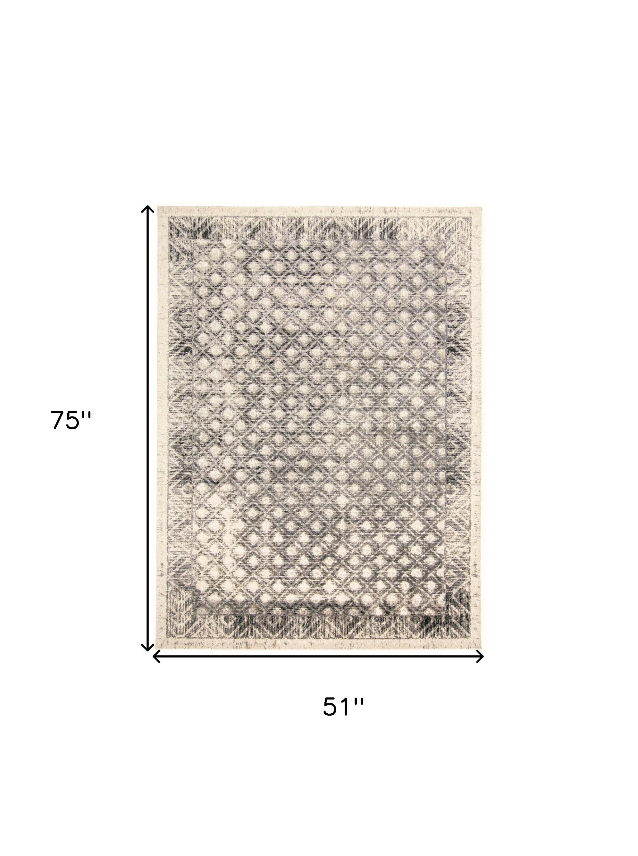 4' X 6' Ivory Black And Taupe Abstract Stain Resistant Area Rug