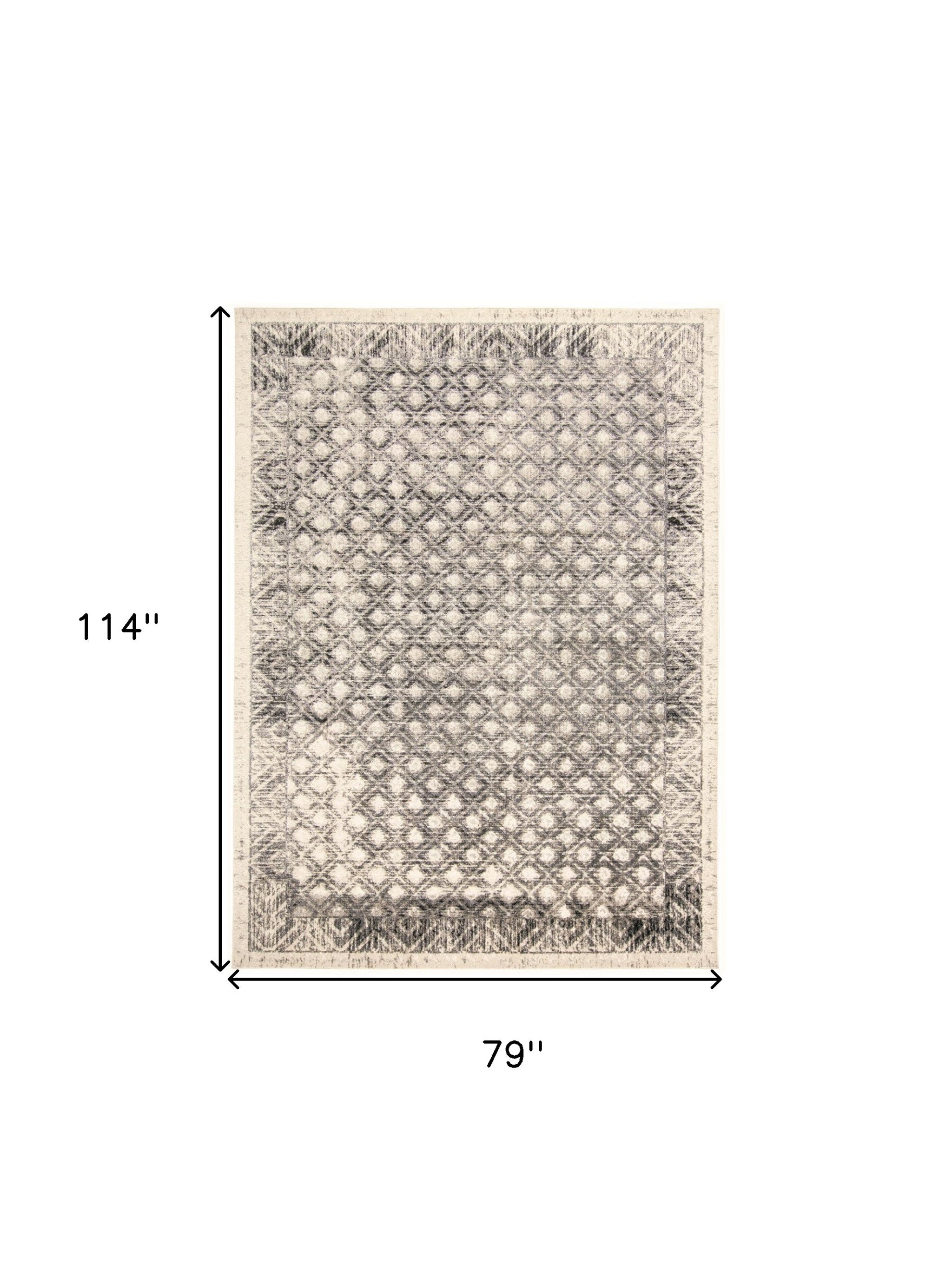 4' X 6' Ivory Black And Taupe Abstract Stain Resistant Area Rug