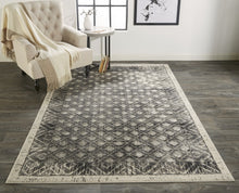4' X 6' Ivory Black And Taupe Abstract Stain Resistant Area Rug