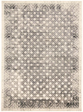 4' X 6' Ivory Black And Taupe Abstract Stain Resistant Area Rug