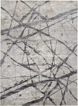 4' X 6' Taupe Gray And Ivory Abstract Stain Resistant Area Rug