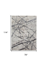 4' X 6' Taupe Gray And Ivory Abstract Stain Resistant Area Rug