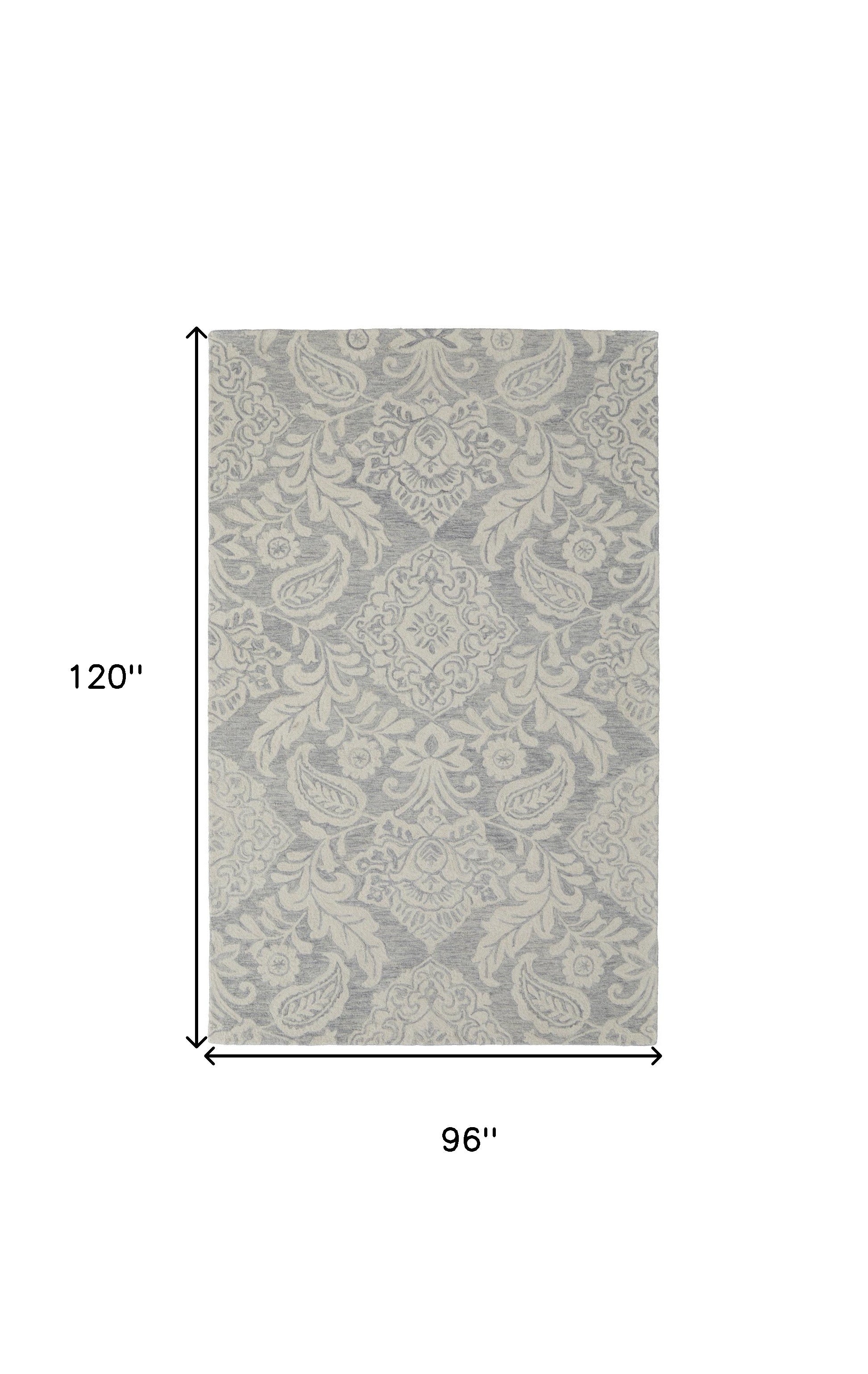 Blue And Ivory Wool Paisley Tufted Handmade Stain Resistant Area Rug - 5' x 8'