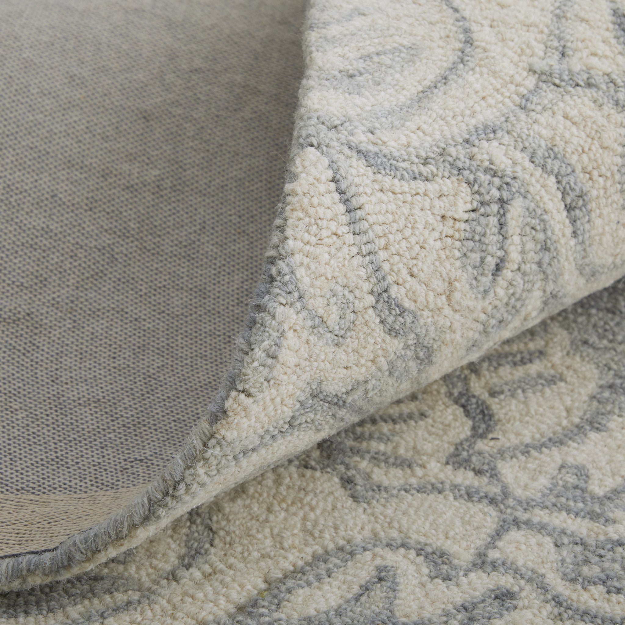 Blue And Ivory Wool Paisley Tufted Handmade Stain Resistant Area Rug - 5' x 8'