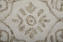 Blue And Ivory Wool Paisley Tufted Handmade Stain Resistant Area Rug - 5' x 8'