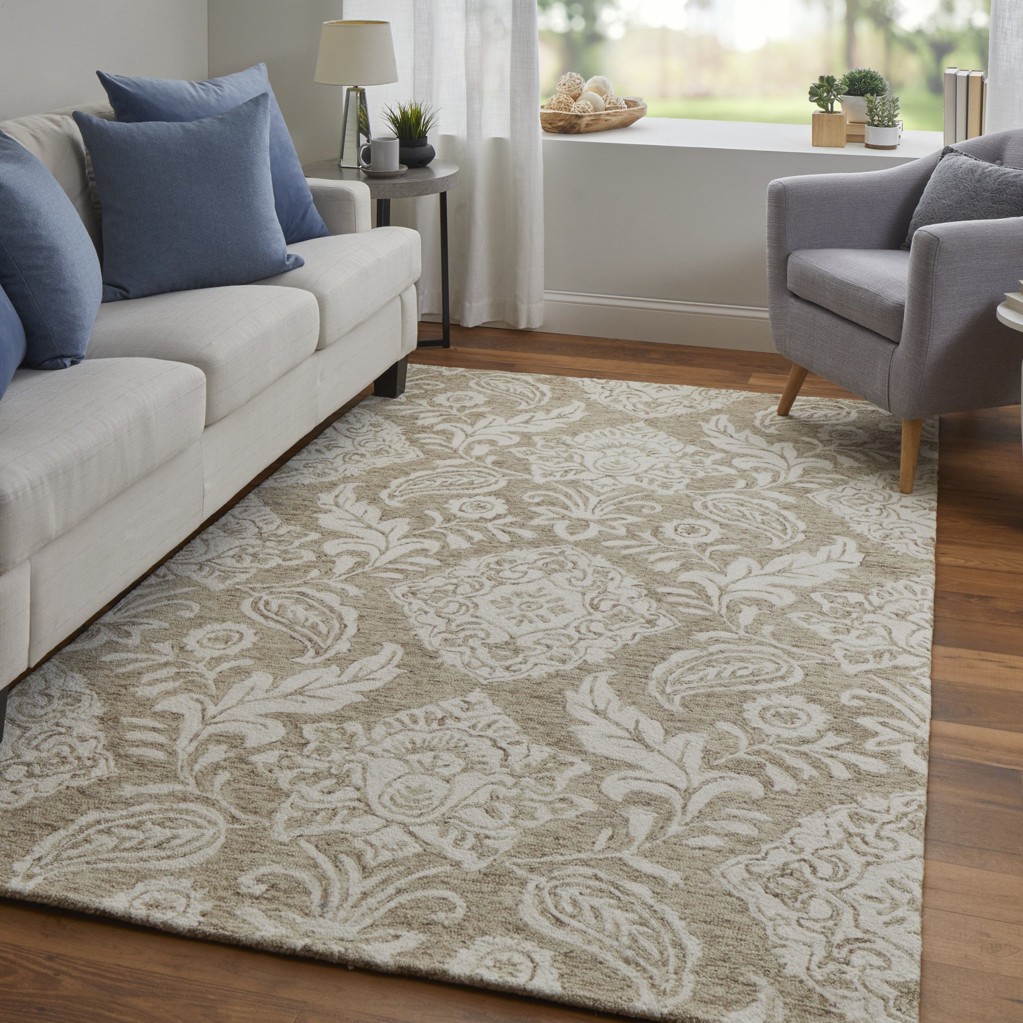Blue And Ivory Wool Paisley Tufted Handmade Stain Resistant Area Rug - 5' x 8'