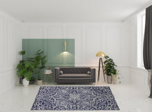 Ivory And Brown Wool Floral Tufted Handmade Stain Resistant Area Rug - 5' x 8'