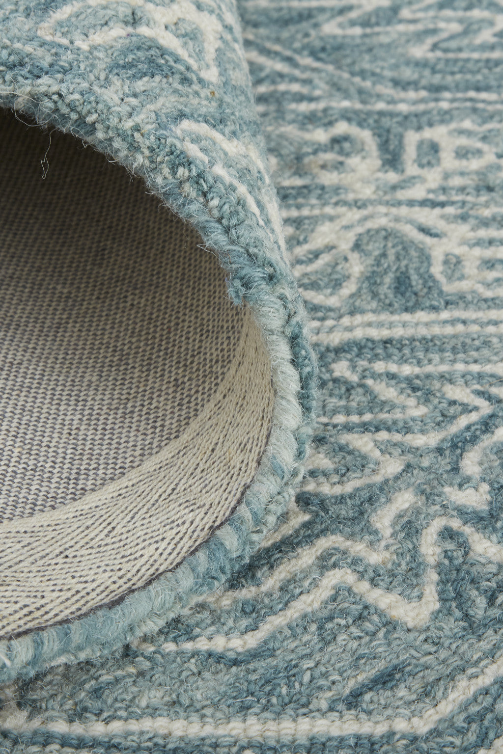 Ivory And Brown Wool Floral Tufted Handmade Stain Resistant Area Rug - 5' x 8'