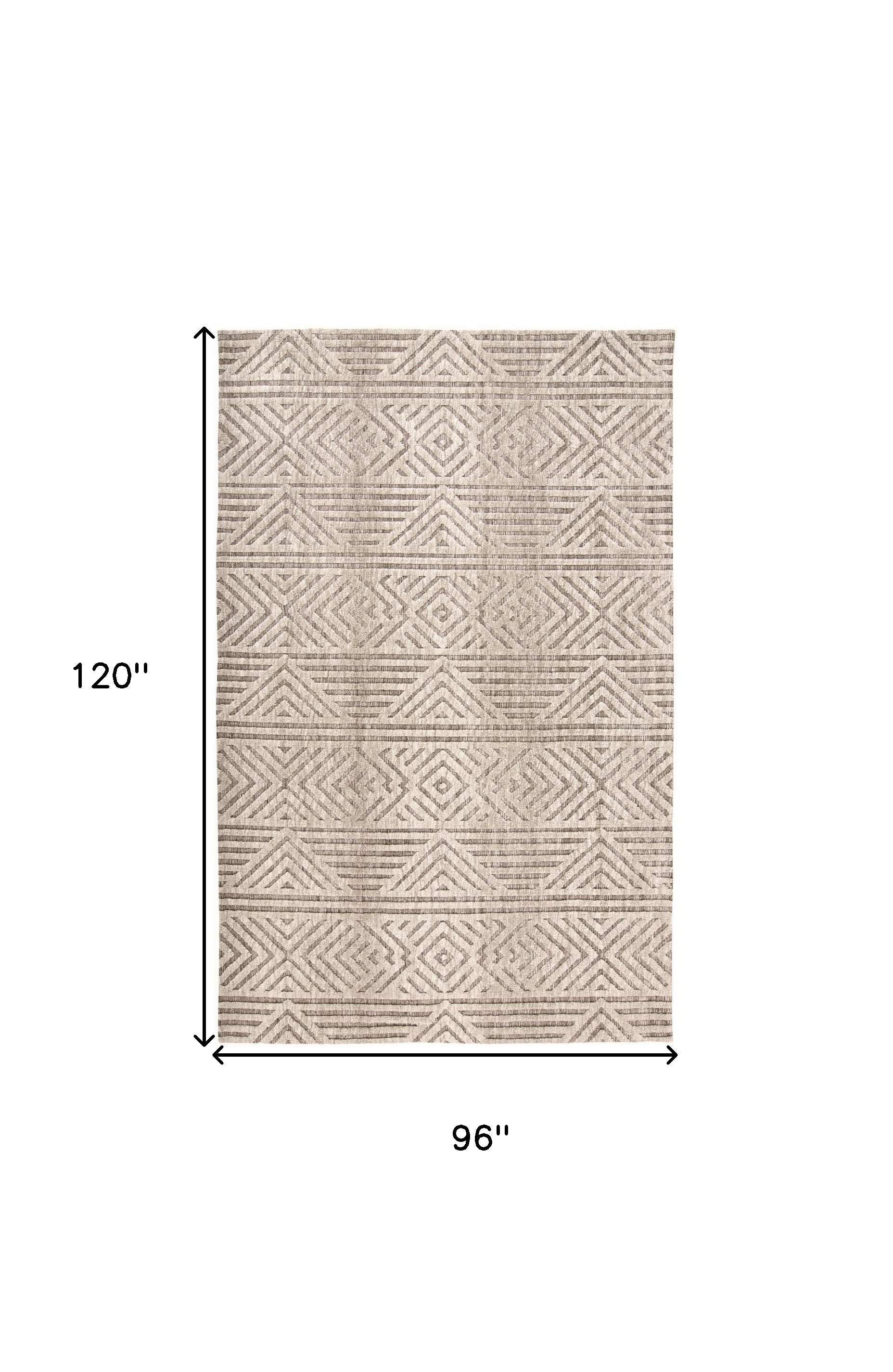 4' X 6' Tan Ivory And Brown Geometric Stain Resistant Area Rug