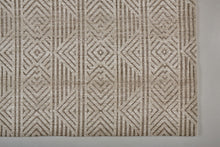 4' X 6' Tan Ivory And Brown Geometric Stain Resistant Area Rug