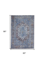 4' X 6' Blue Gray And Gold Floral Stain Resistant Area Rug