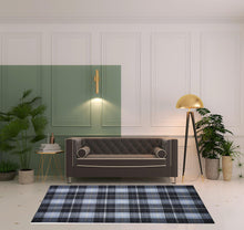 Blue Green And Black Abstract Hand Woven Stain Resistant Area Rug - 4' x 6'