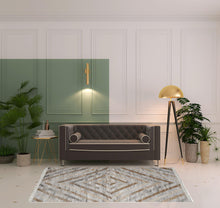 4' X 6' Ivory Gray And Tan Geometric Hand Woven Stain Resistant Area Rug With Fringe