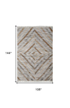 4' X 6' Ivory Gray And Tan Geometric Hand Woven Stain Resistant Area Rug With Fringe