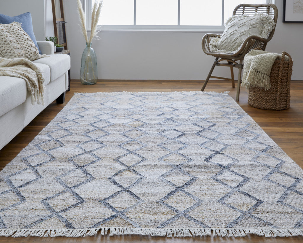Gray Ivory And Tan Geometric Hand Woven Stain Resistant Area Rug With Fringe - 4' x 6'