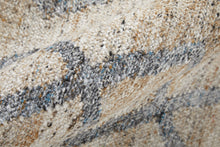 Gray Ivory And Tan Geometric Hand Woven Stain Resistant Area Rug With Fringe - 4' x 6'