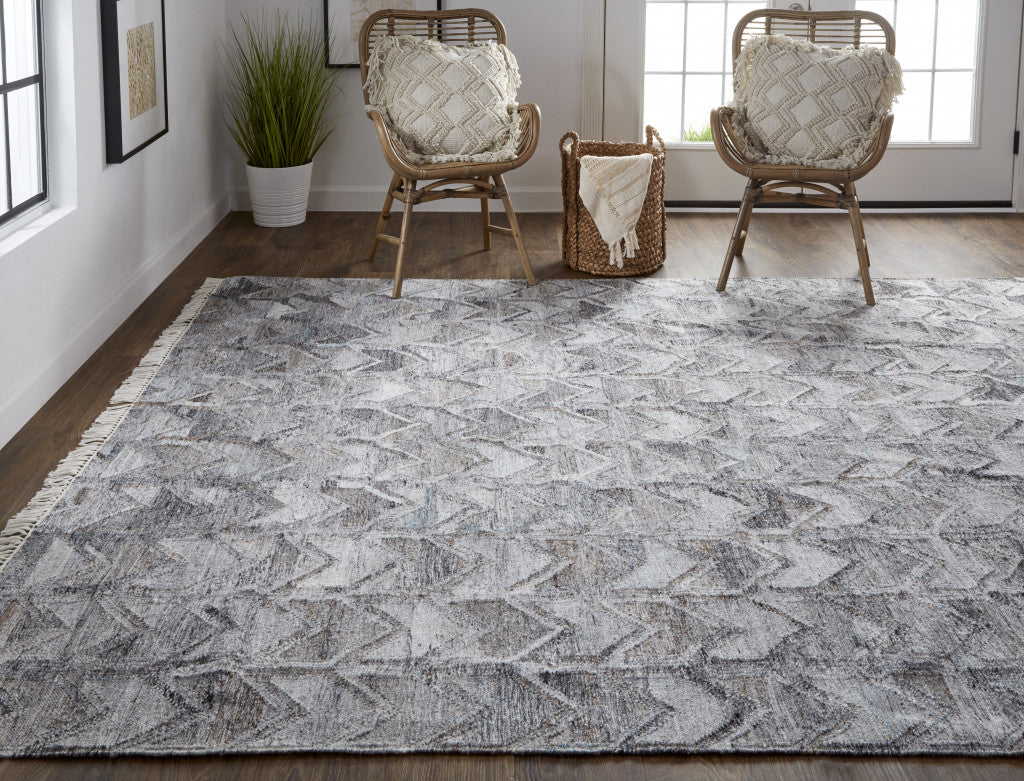 4' X 6' Gray Silver And Taupe Geometric Hand Woven Stain Resistant Area Rug With Fringe