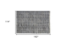 4' X 6' Gray Silver And Ivory Geometric Hand Woven Stain Resistant Area Rug With Fringe