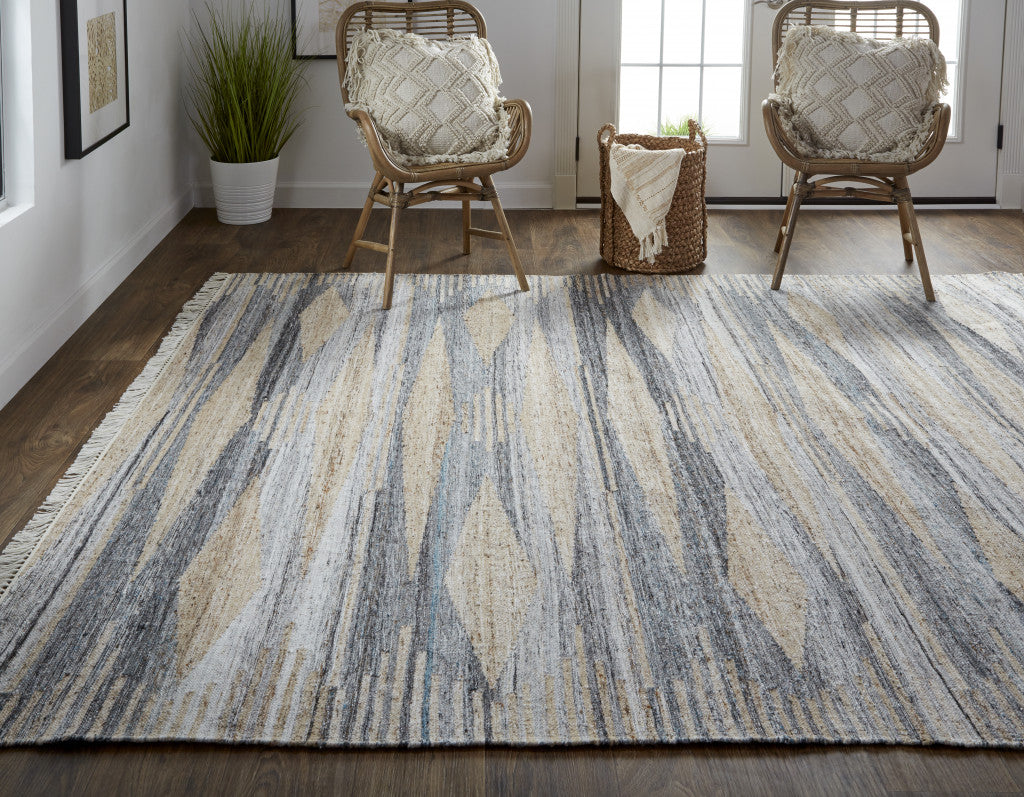 5' X 8' Gray Tan And Silver Abstract Hand Woven Stain Resistant Area Rug With Fringe