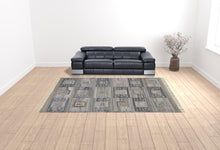 Gray Taupe And Tan Geometric Hand Woven Stain Resistant Area Rug With Fringe - 4' x 6'