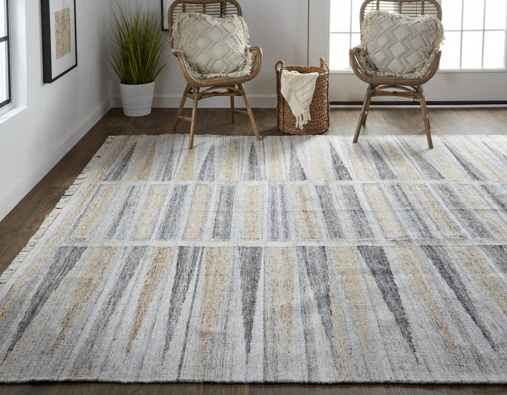 Tan Gray And Taupe Geometric Hand Woven Stain Resistant Area Rug With Fringe - 4' x 6'