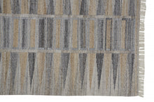 Tan Gray And Taupe Geometric Hand Woven Stain Resistant Area Rug With Fringe - 4' x 6'