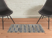 Tan Gray And Taupe Geometric Hand Woven Stain Resistant Area Rug With Fringe - 4' x 6'