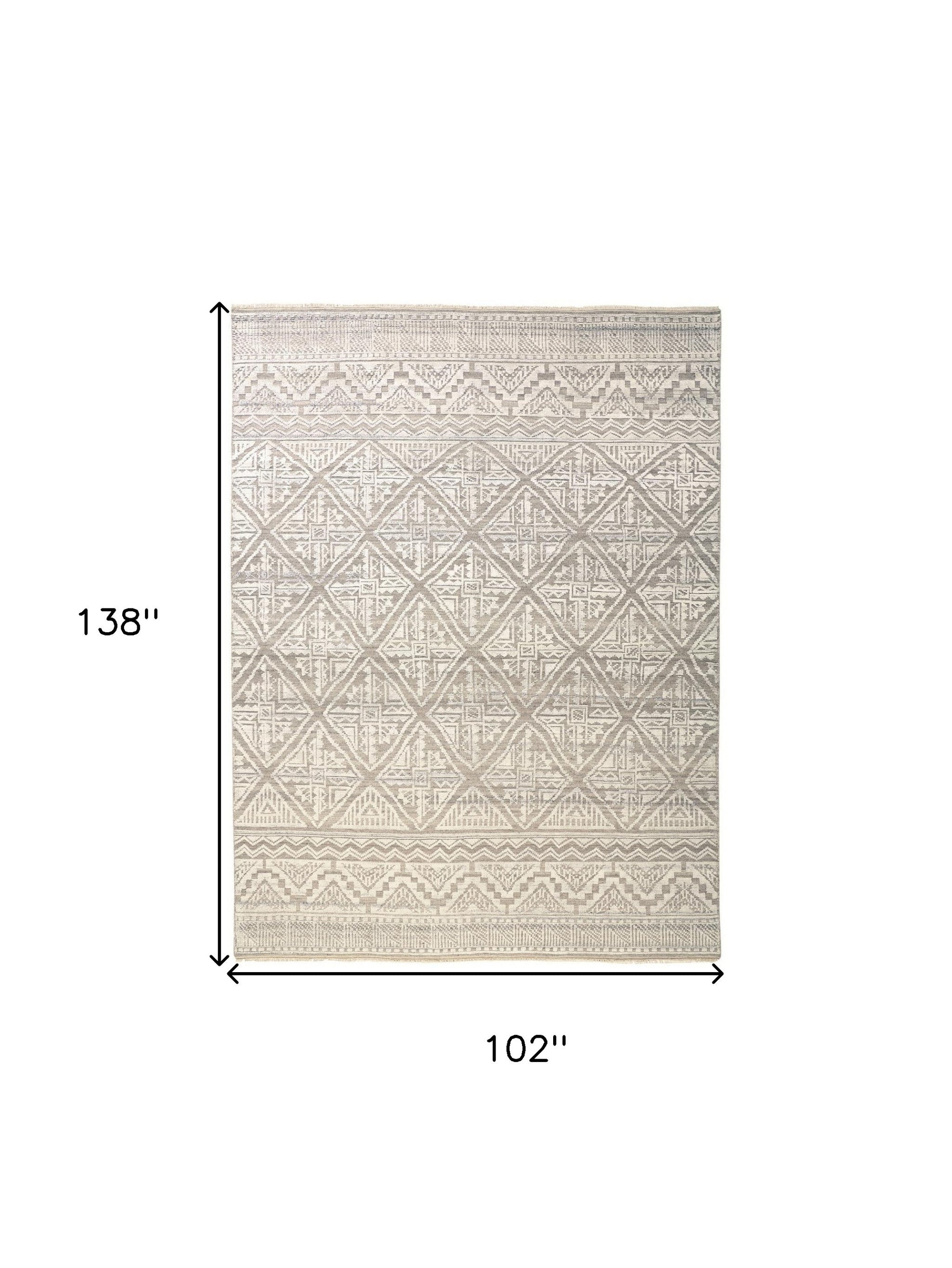 4' X 6' Ivory Tan And Gray Geometric Hand Knotted Area Rug