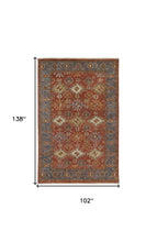 4' X 6' Red Blue And Orange Wool Floral Hand Knotted Stain Resistant Area Rug With Fringe