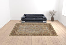 4' X 6' Gray Brown And Gold Wool Floral Hand Knotted Stain Resistant Area Rug With Fringe