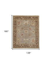 4' X 6' Gray Brown And Gold Wool Floral Hand Knotted Stain Resistant Area Rug With Fringe