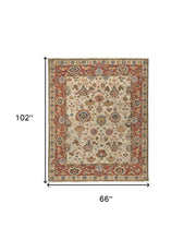 5' X 8' Ivory Red And Blue Wool Floral Hand Knotted Stain Resistant Area Rug