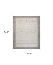 4' X 6' Ivory And Gray Wool Hand Knotted Stain Resistant Area Rug