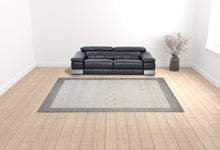 4' X 6' Ivory And Gray Wool Hand Knotted Stain Resistant Area Rug