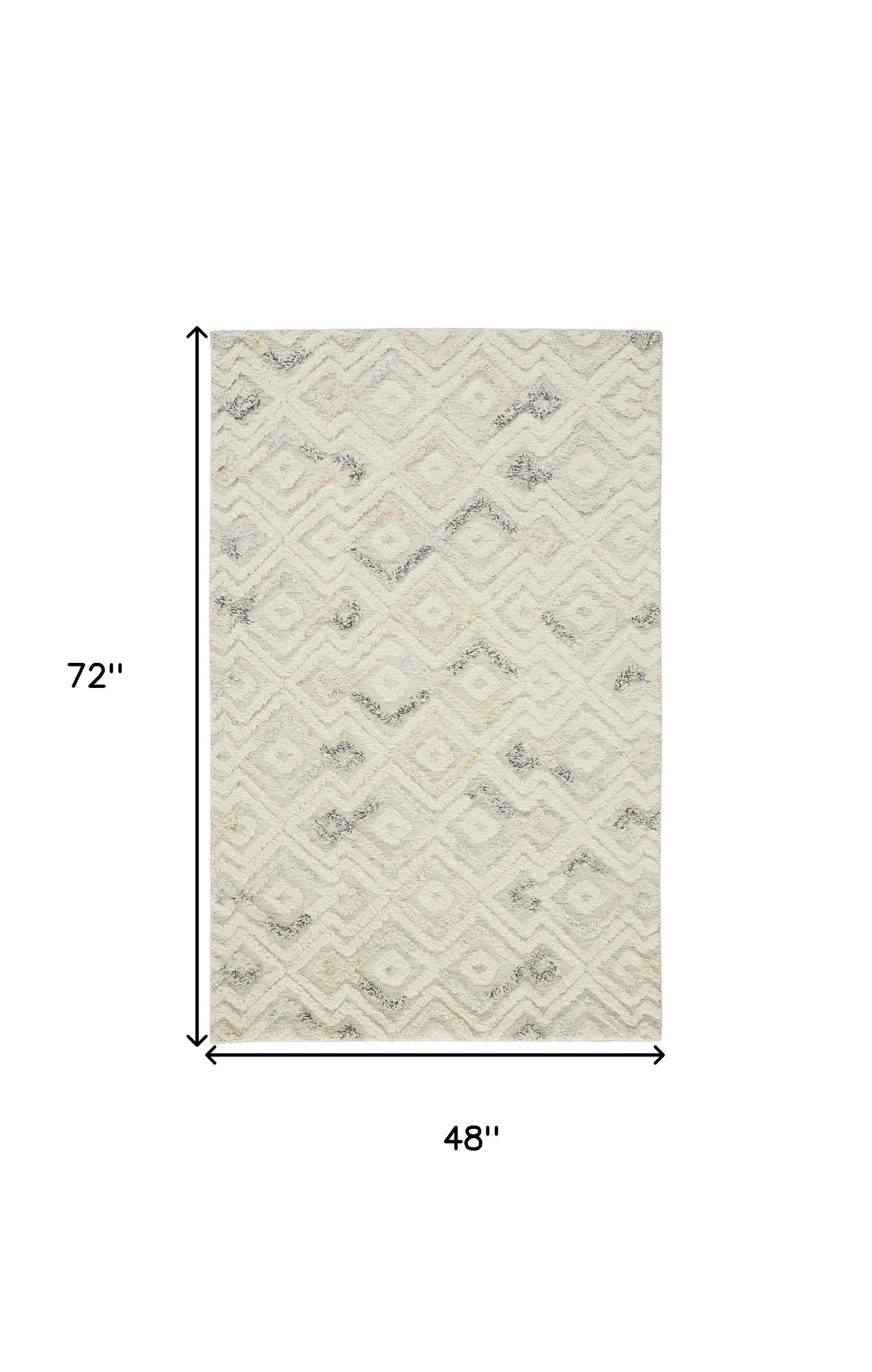 Gray And Ivory Wool Geometric Tufted Handmade Area Rug - 4' x 6'