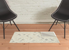 Gray And Ivory Wool Geometric Tufted Handmade Area Rug - 4' x 6'